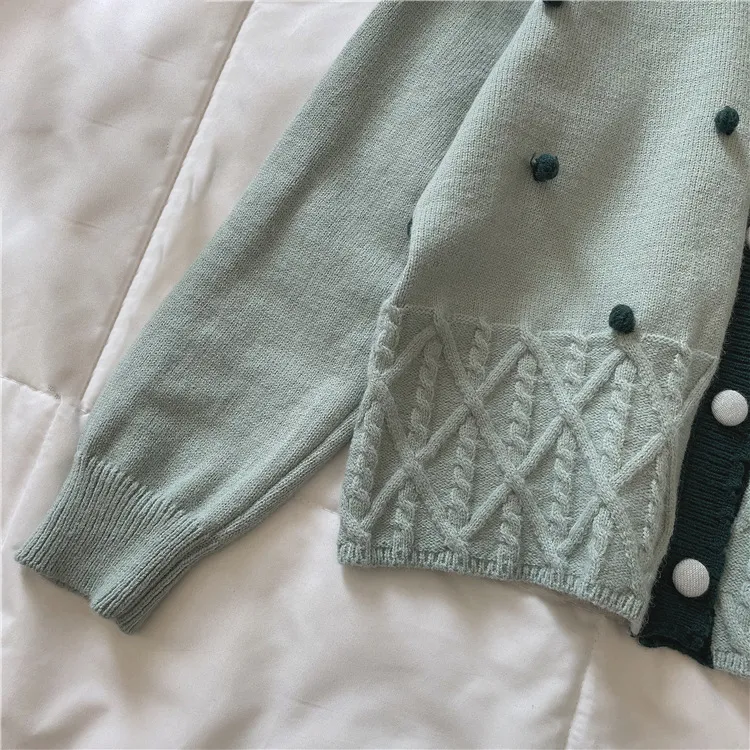 custom-pom-pom-cable-knit-cardigan-v-neck-sweater-sleeve-details