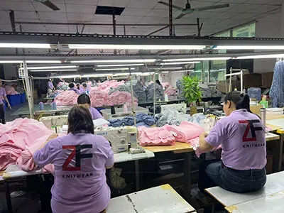 Skilled workers performing garment processing and assembly in China Sweater Manufacturer 
