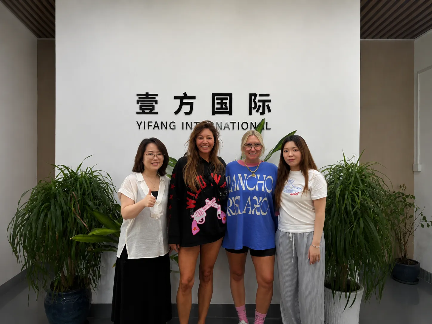American partners visiting Yifang International knitwear factory Guangzhou China