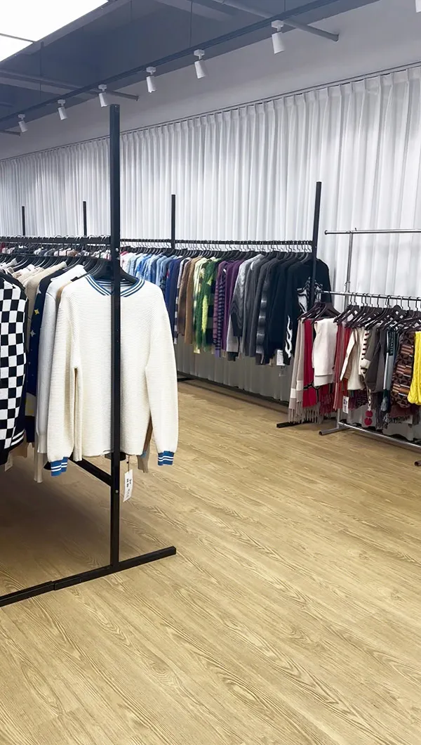 zfong knitwear showroom displaying oem sweaters and scarves